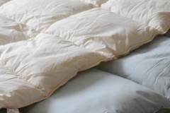 Sin pelusa, sin plumas o cómo lavar a máquina un edredón y una mano