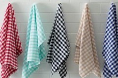 Formas probadas para eliminar las manchas rebeldes de grasa de los paños de cocina